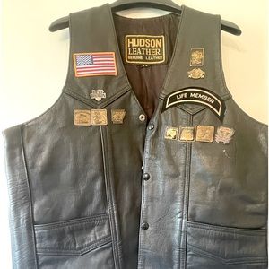 Leather vest.  Size 44. Life member Harley Davison group. Many pens original.